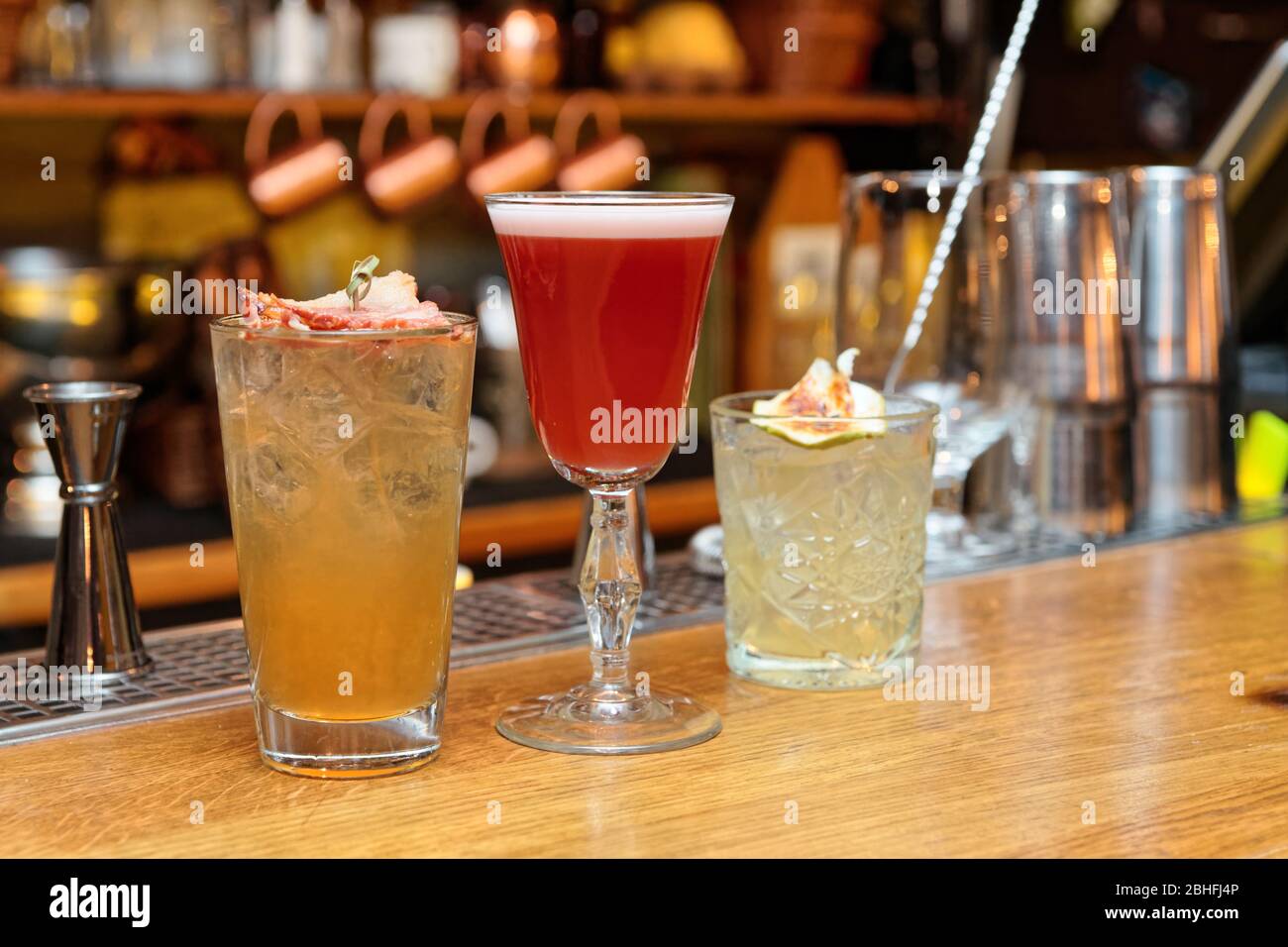 Three different cocktails served on bar counter Stock Photo Alamy