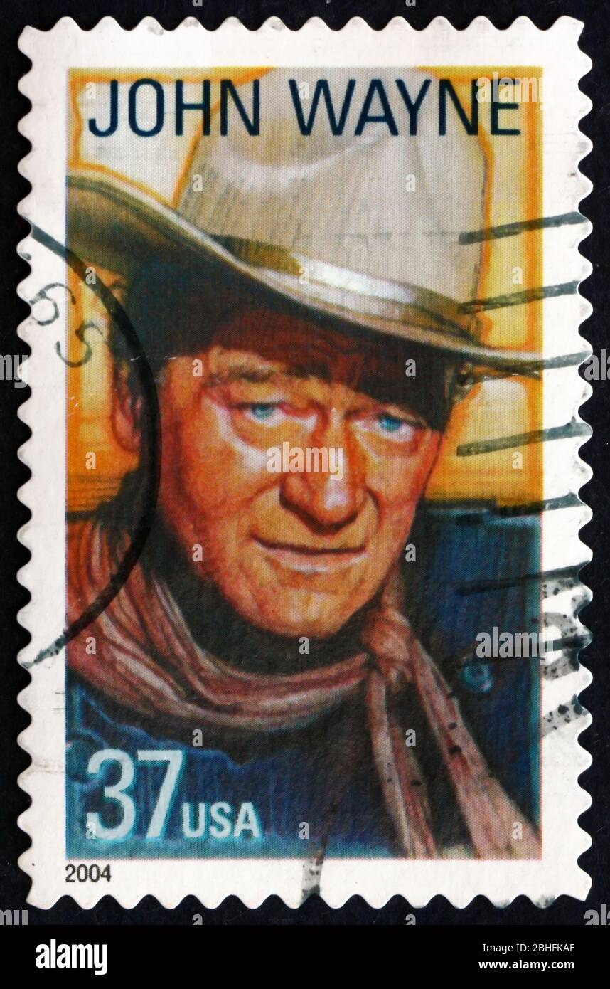 USA CIRCA 2004 a stamp printed in the USA shows John Wayne, American