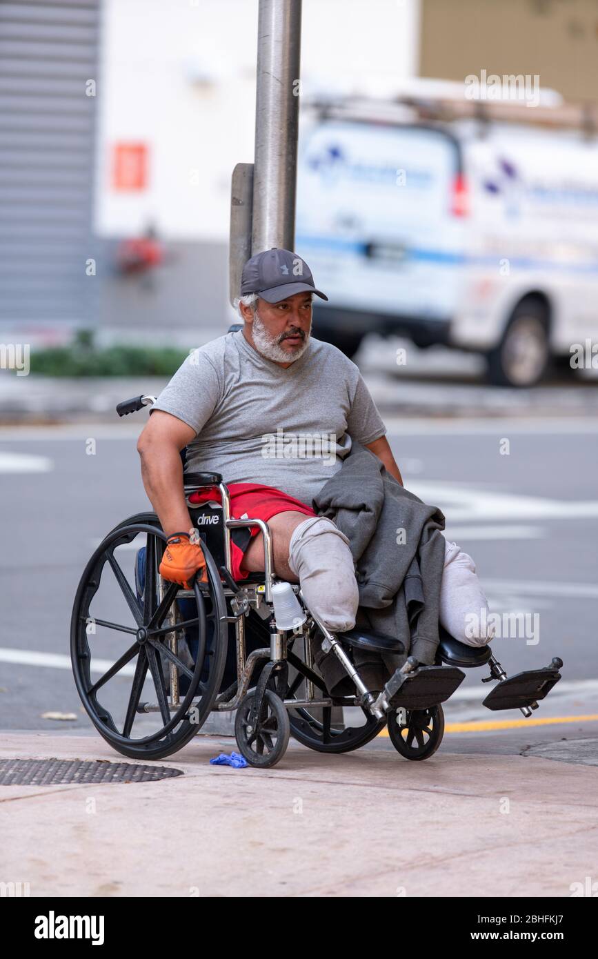 Homeless man in a wheelchair Downtown Miami FL Stock Photo
