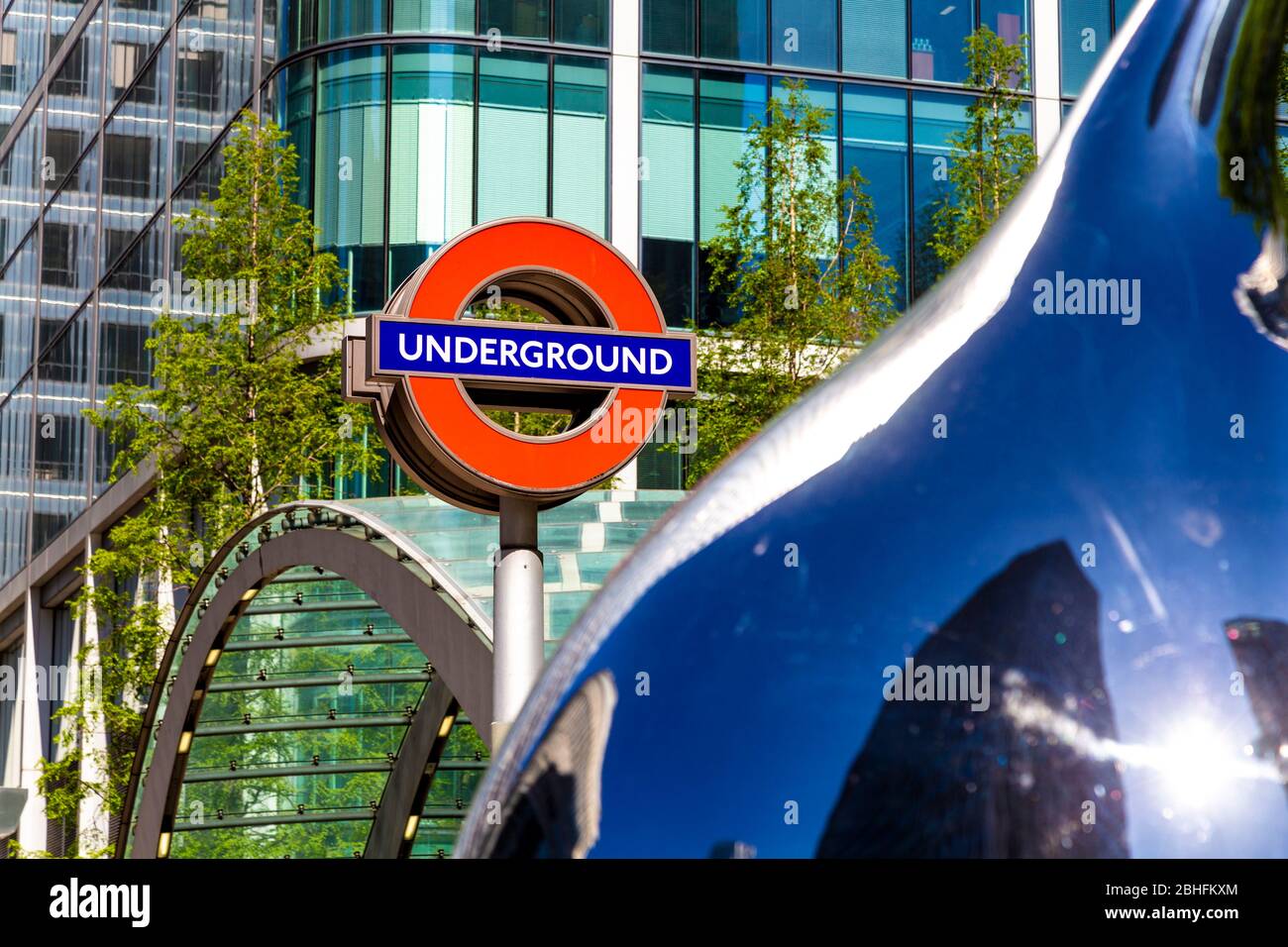 Underground station sign at Canary Wharf Reuters Plaza entrance, London, UK Stock Photo