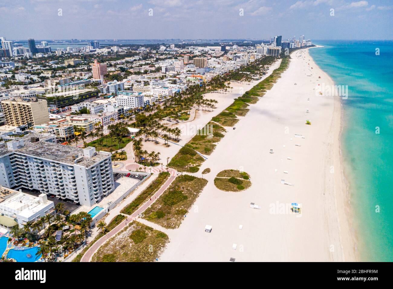 Miami Beach Florida,Atlantic Ocean water,South Beach,public,aerial overhead bird's eye view above,sand water surf,Lummus Park Beach Walk path,coronavi Stock Photo