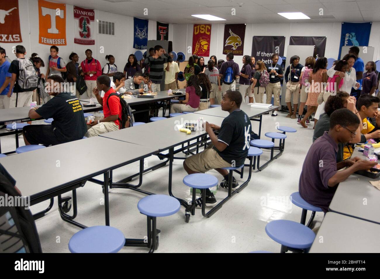 African American Male Student Sits Alone At Table During Lunch In out-to-lunch-sign-for-desk-printable-office-sign-be-back-soon-sign