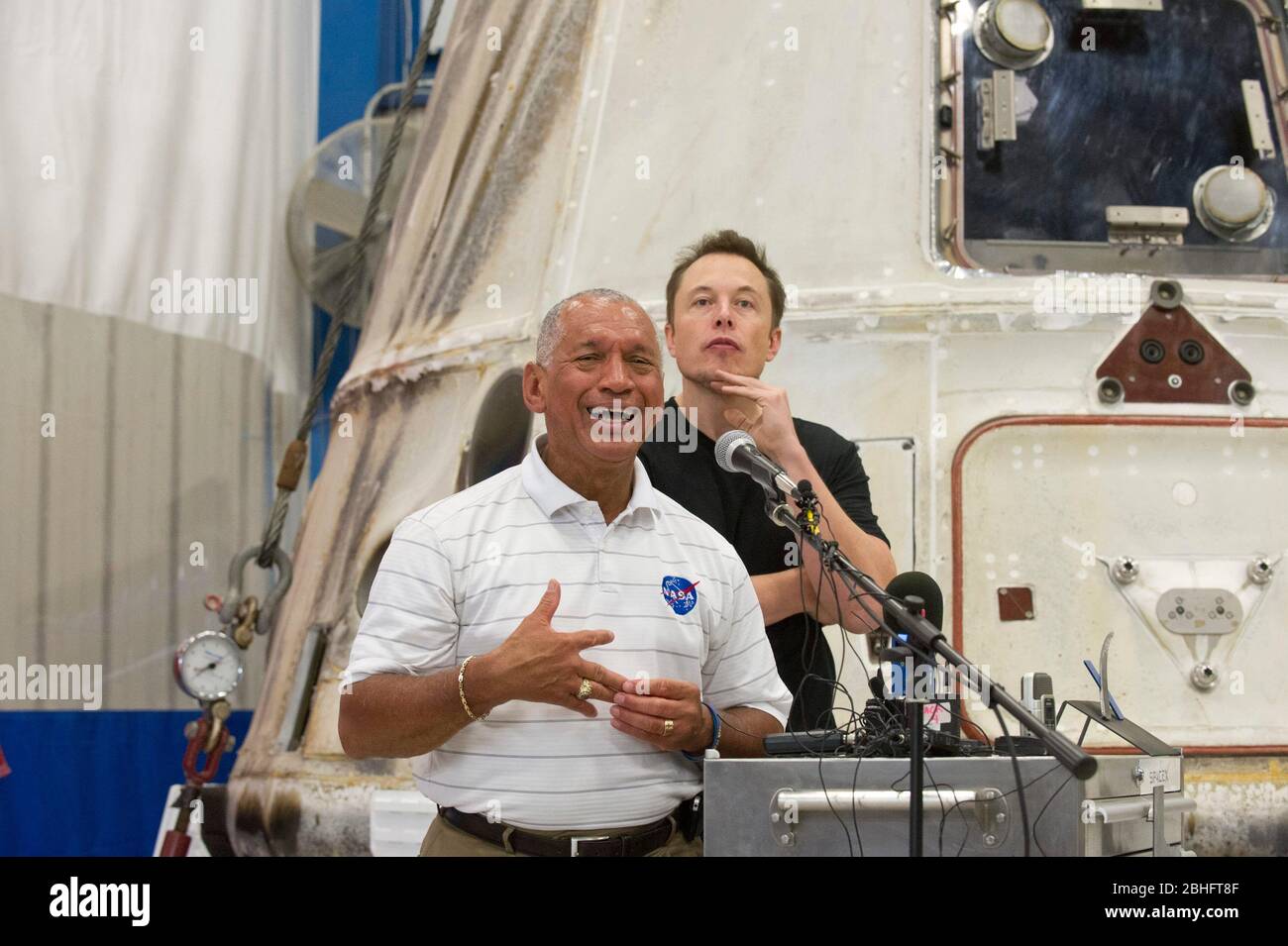 McGregor, Texas USA, June 13, 2012: NASA administrator Charles Bolden, left, and SpaceX CEO and Chief Designer Elon Musk answer questions about the private Dragon spacecraft that returned to earth May 31st after delivering supplies to the International Space Station. ©Bob Daemmrich Stock Photo