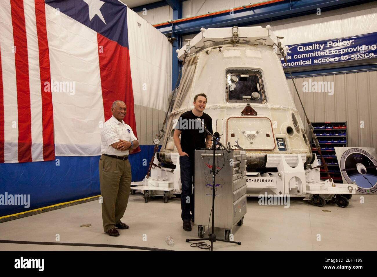 McGregor, Texas USA, June 13, 2012: SpaceX CEO and Chief Designer Elon Musk answers questions about the private Dragon spacecraft that returned to earth May 31st after delivering supplies to the International Space Station. NASA administrator Charles Bolden listens at left. ©Bob Daemmrich Stock Photo