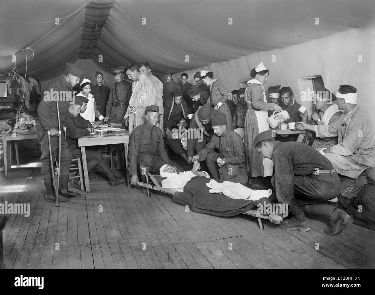 Wounded American Soldiers being received from Ambulances, Evacuation Tent, American Military Hospital No. 5, Auteuil, France, Lewis Wickes Hine, American National Red Cross Photograph Collection, September 1918 Stock Photo