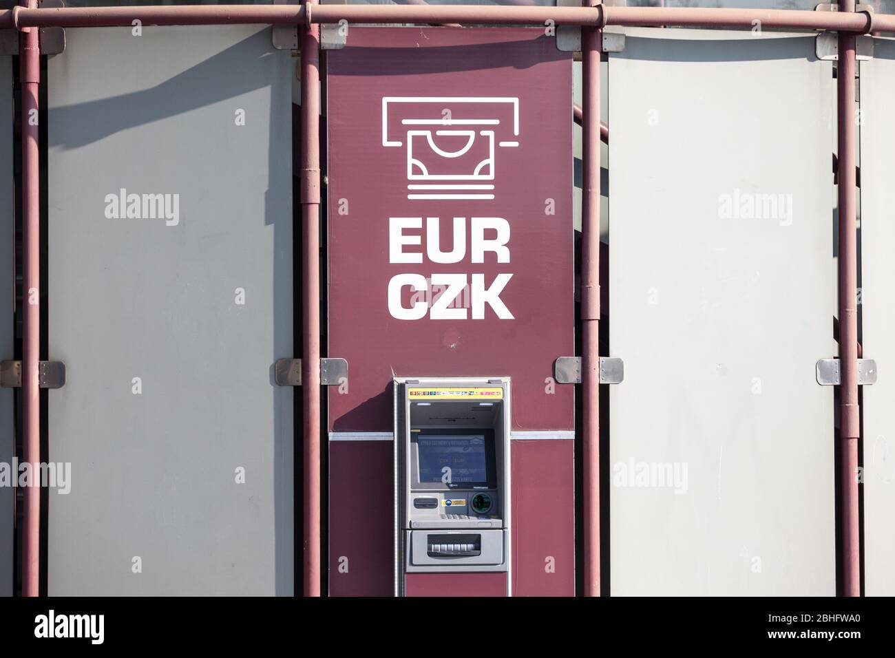 PRAGUE, CZECHIA - OCTOBER 31, 2019: ATM changing & distributing money in Czech currency, the Czech Crown, CZK, and European currency, the Euro, EUR, d Stock Photo