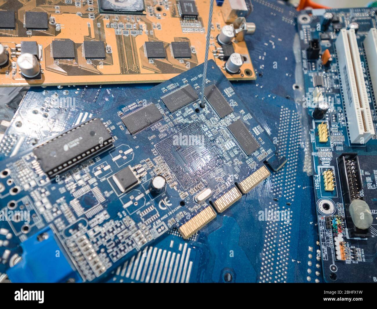 Trento, Italy - November 19, 2017: Detail of electronic boards representing the concept of technological evolution. Stock Photo