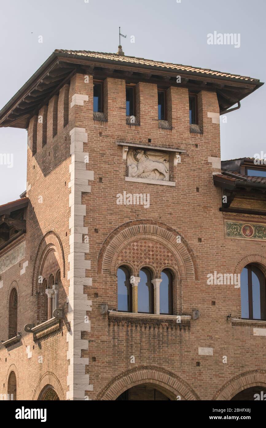 Renaissance brick tower with triple lancet window. Stock Photo