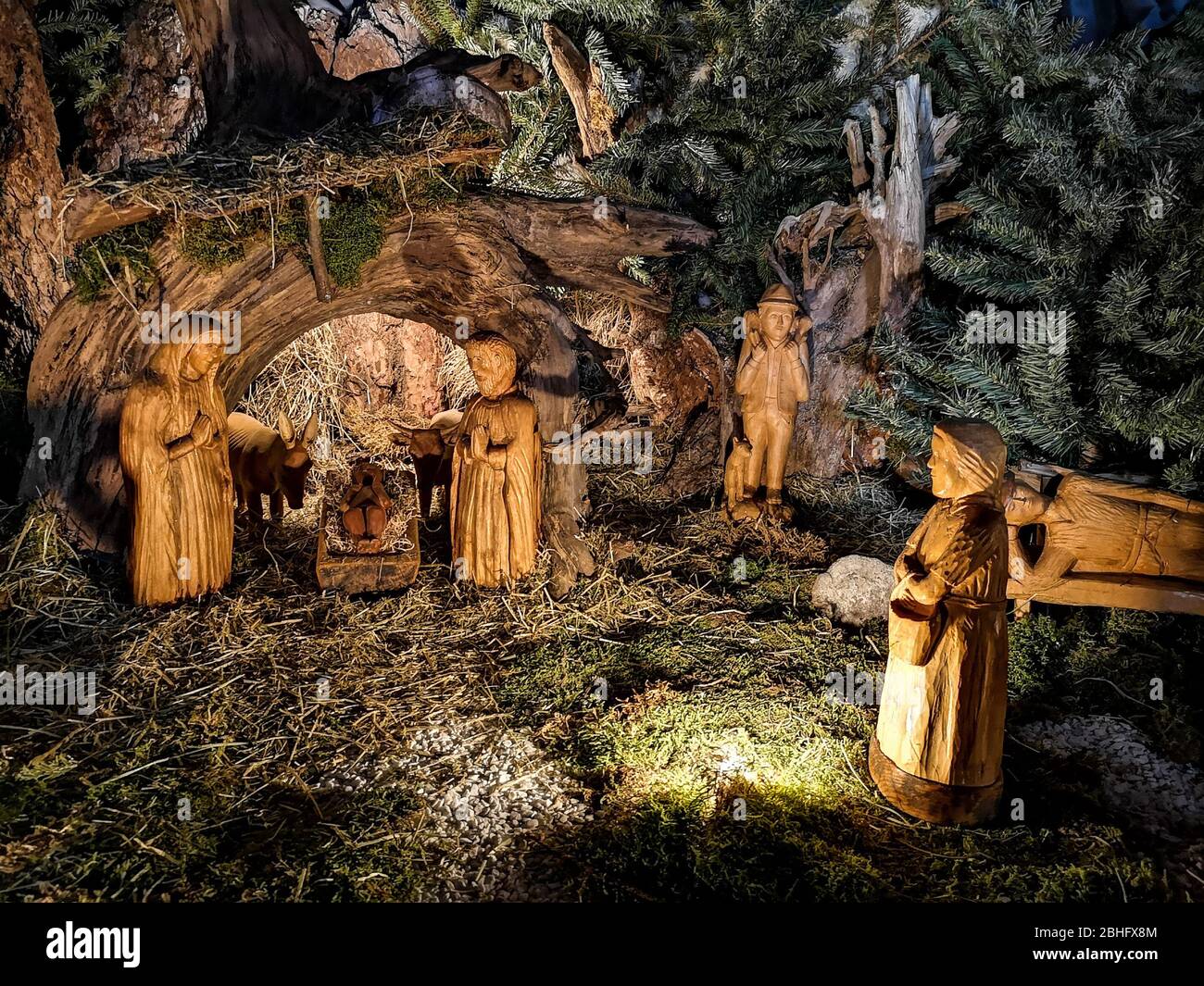 Ossana, Italy - December 26, 2019: Nativity scene made with hand-carved wooden figurines. Stock Photo