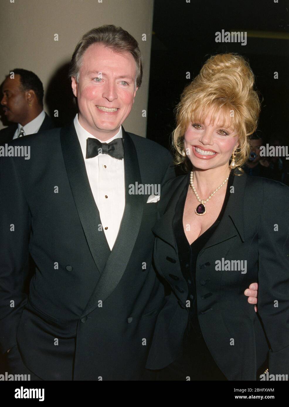 LOS ANGELES, CA. c.1994: Actress Loni Anderson & Geoff Brown.  File photo © Paul Smith/Featureflash Stock Photo