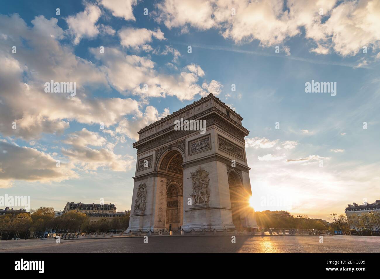 Paris France city skyline sunset at Arc de Triomphe and Champs Elysees empty nobody Stock Photo