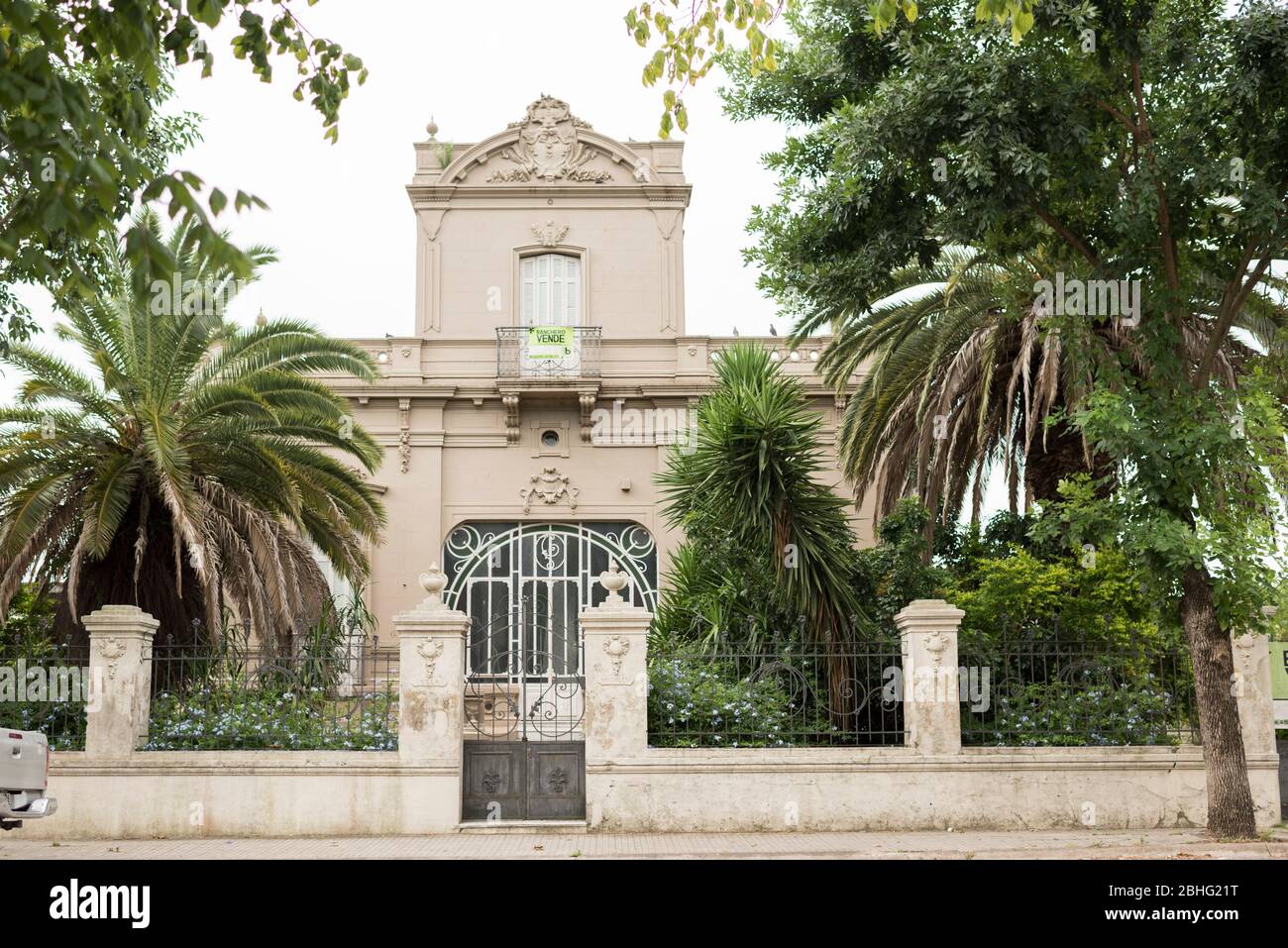 Carmelo, Colonia / Uruguay; Dec 27, 2018: Old mansion in one of the streets surrounding Plaza Artigas; It is unoccupied, with signs of being for sale Stock Photo
