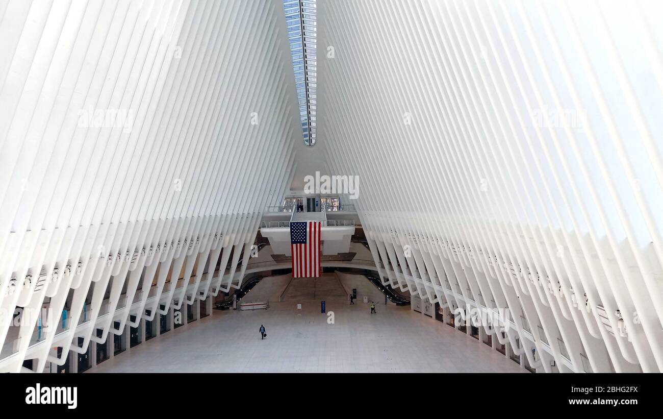 New York City, New York, United States. 25th Apr, 2020. The inside of the Oculus Transit Hub in lower Manhattan was empty still on Saturday afternoon. Warm temperatures on a beautiful spring day seemed to bring people outside in varying degrees across the city, though most public transportation was still only very lightly used. Credit: Adam Stoltman/Alamy Live News Stock Photo