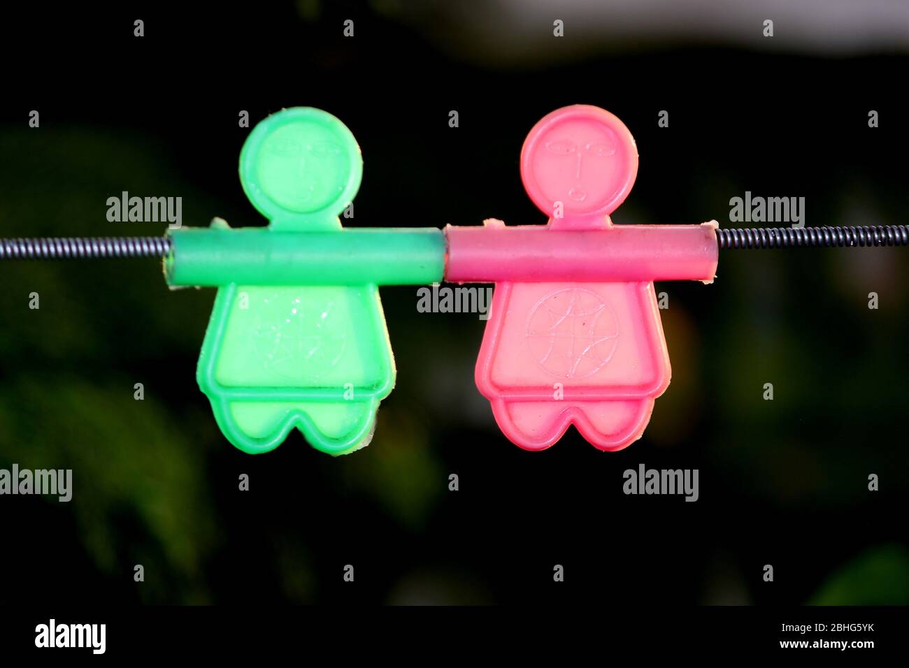 colorful hanging plastic character toy for kids playing, selective focus with blur background. Stock Photo