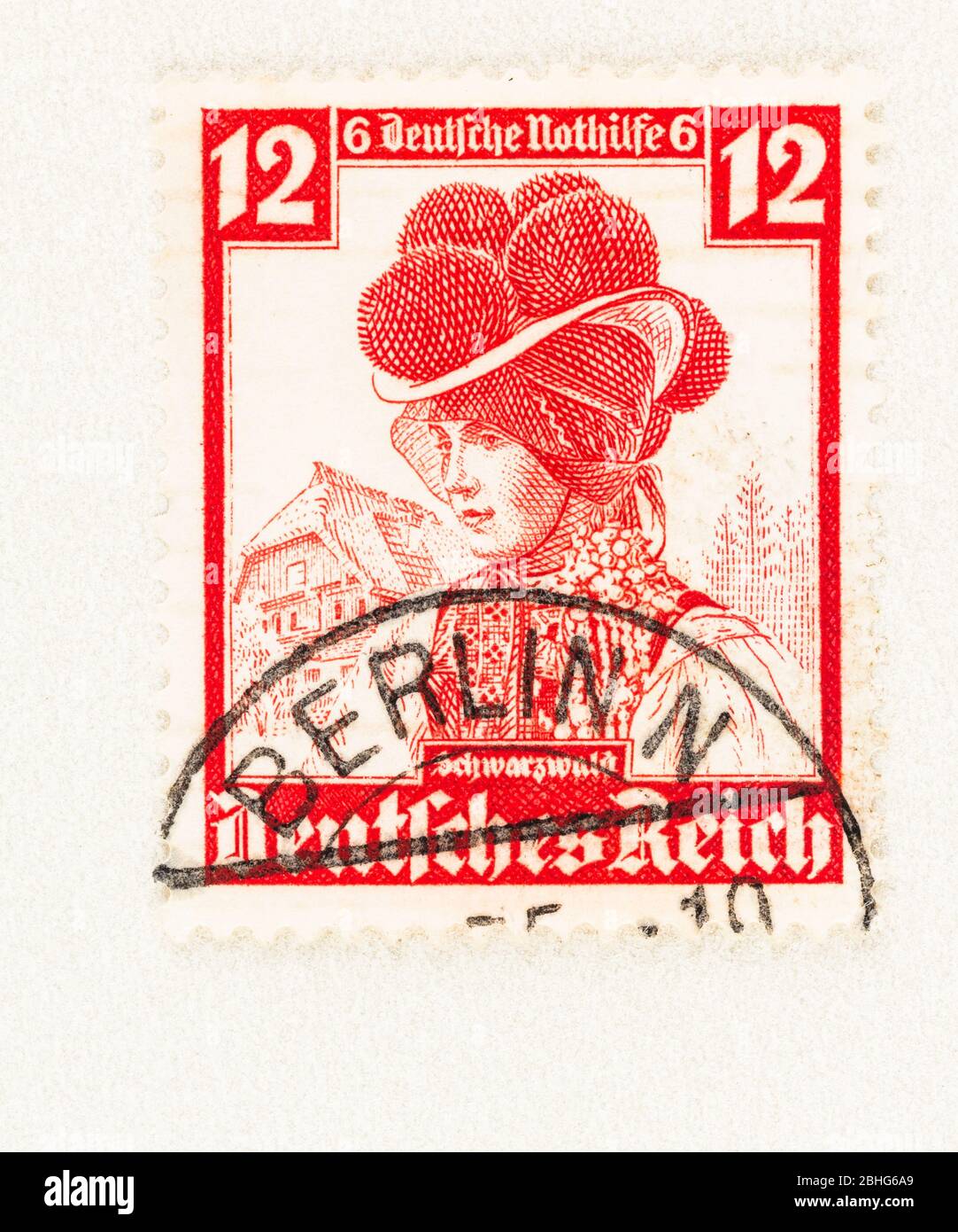 SEATTLE WASHINGTON - April 25, 2020: German Reich stamp  featuring  Gutachtal woman with bollen hat, a traditional headdress of the Balck Forest. Scot Stock Photo