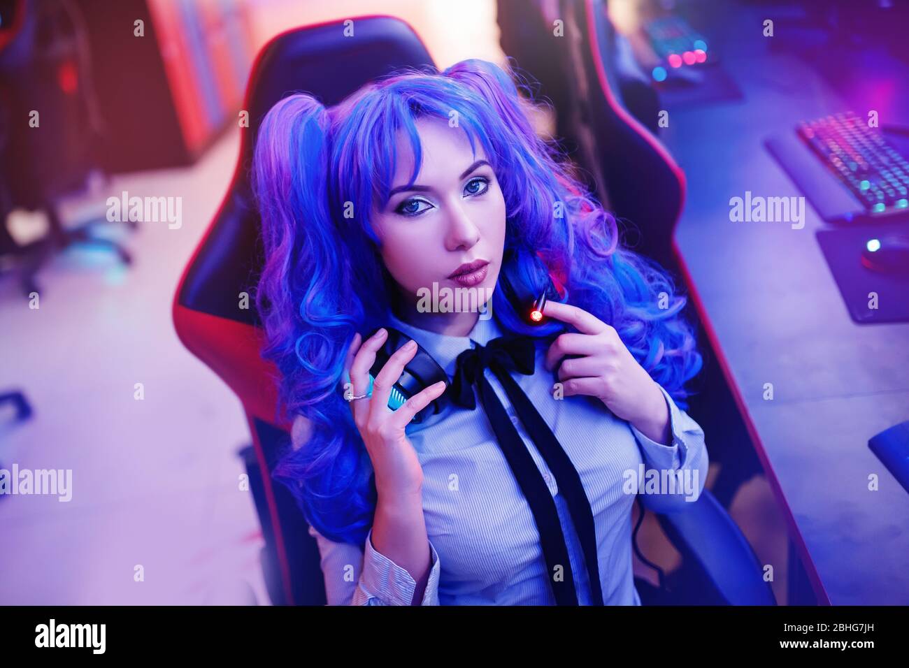 Young woman streamer anime cosplay professional gamer playing video online  games computer Stock Photo - Alamy