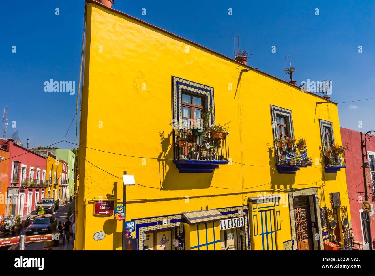 Colorful Orange Yellow, Green Balconies Shopping Street Puebla Mexico Stock Photo