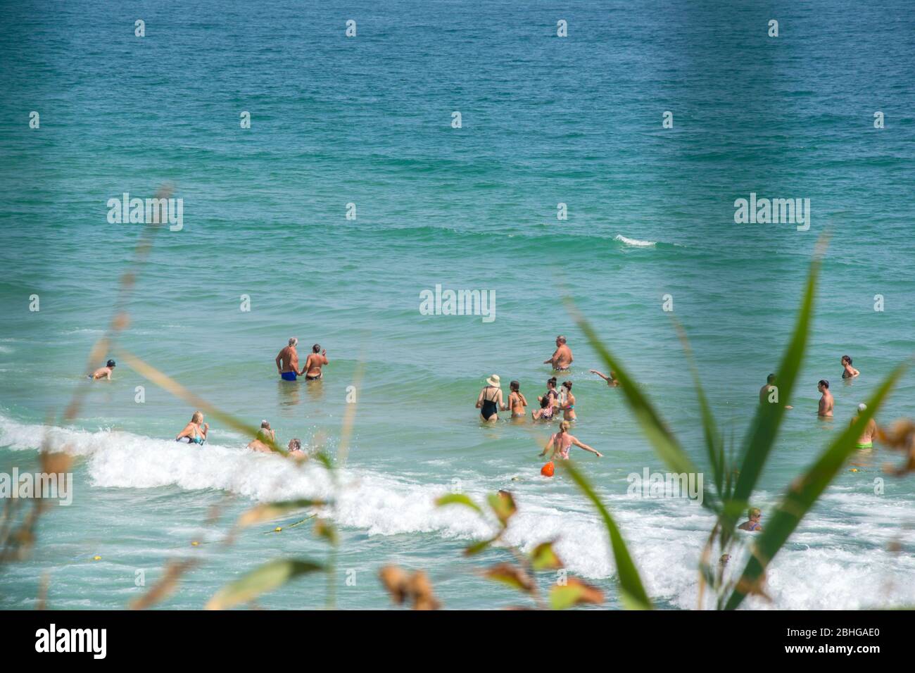 People enjoying the hot weather, beach fun human in the water
