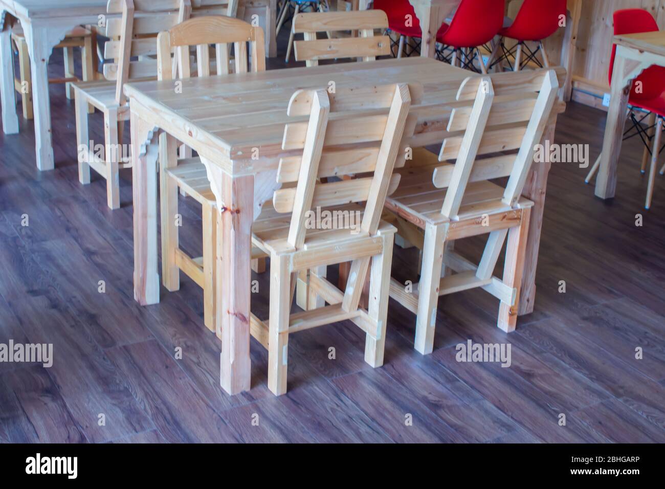 Wooden tables and chairs Stock Photo Alamy