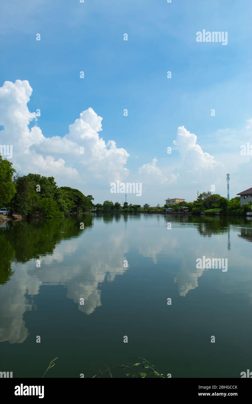 The beauty of the sky that reflects the water. Stock Photo