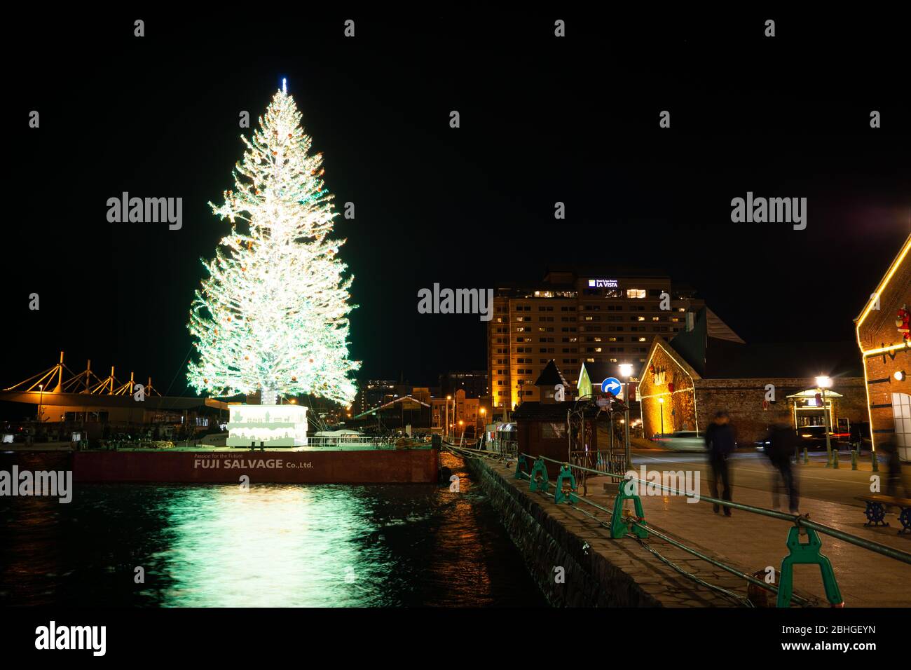 Hakodate, Japan-29Nov2019: Huge Christmas Tree at Red Brick Warehouse in winter season, the floating tree is colored with illumination of 50,000 light Stock Photo