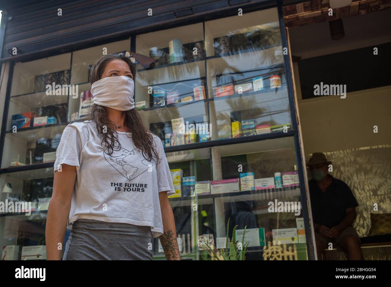 American tourist standing outside a pharmacy during the Covid-19 lockdown in India. Stock Photo