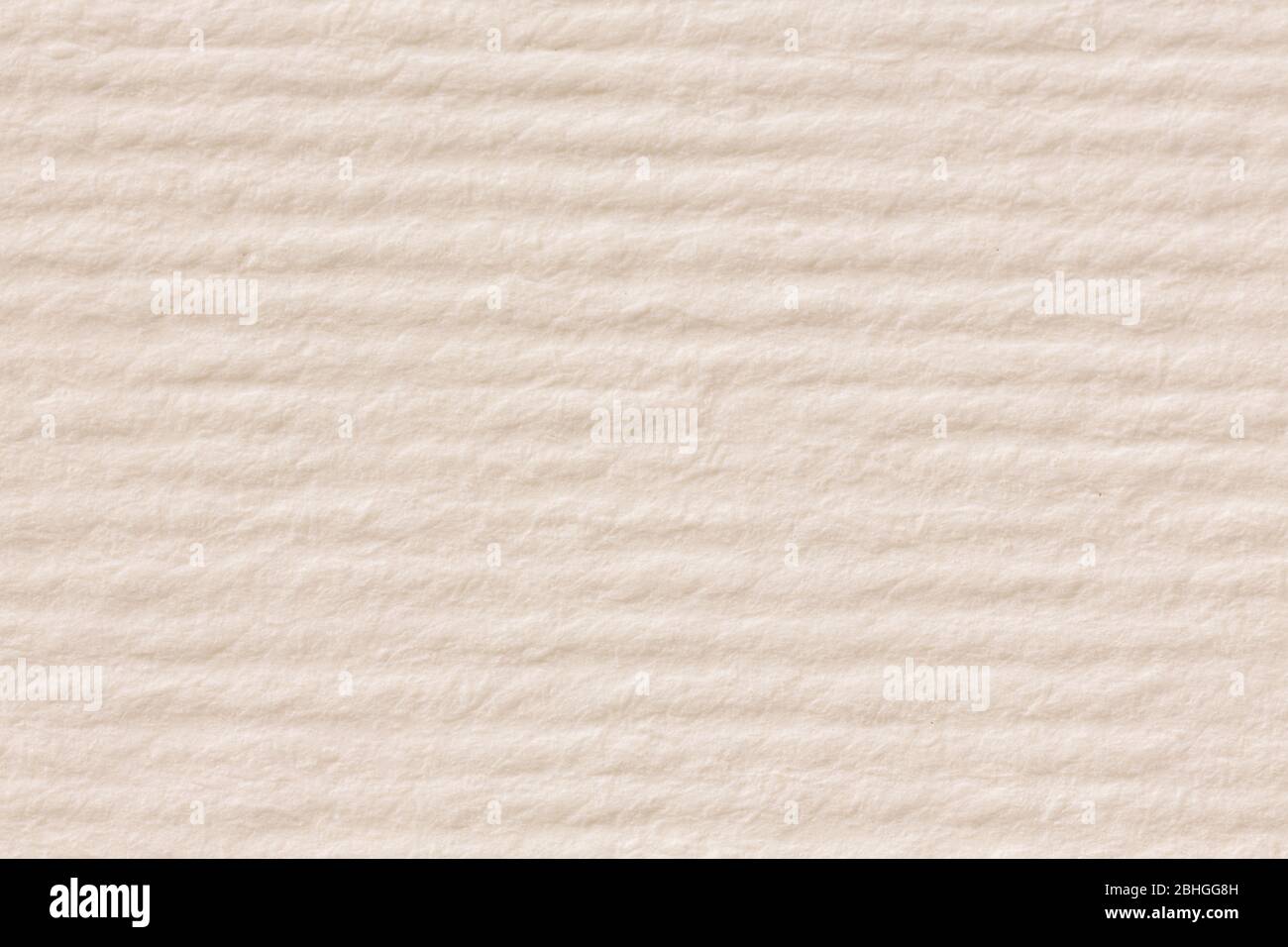 Stripped beige paper texture background close up. Stock Photo