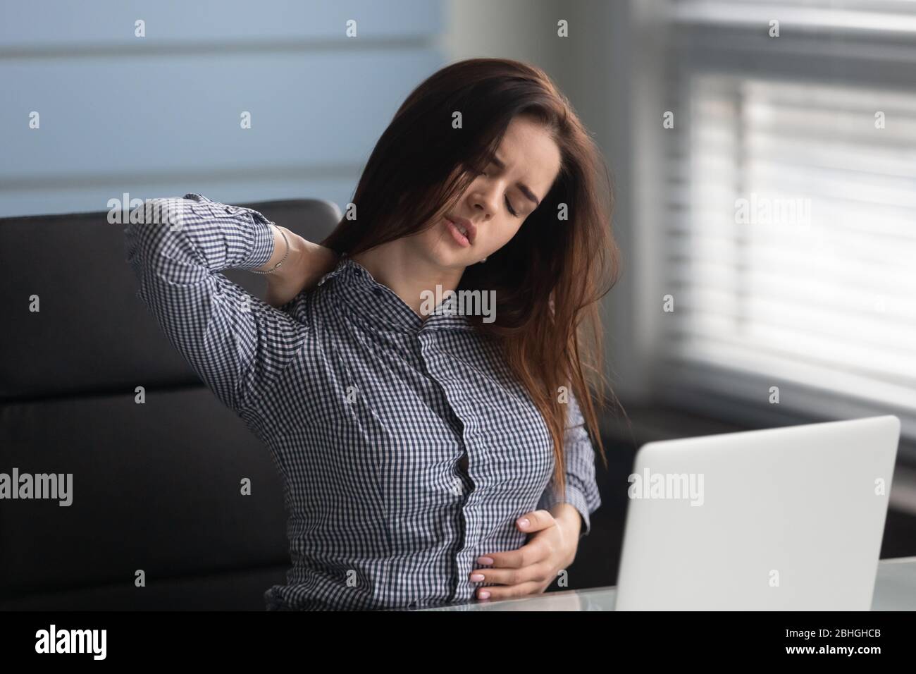 Office worker pain from hi-res stock photography and images - Alamy