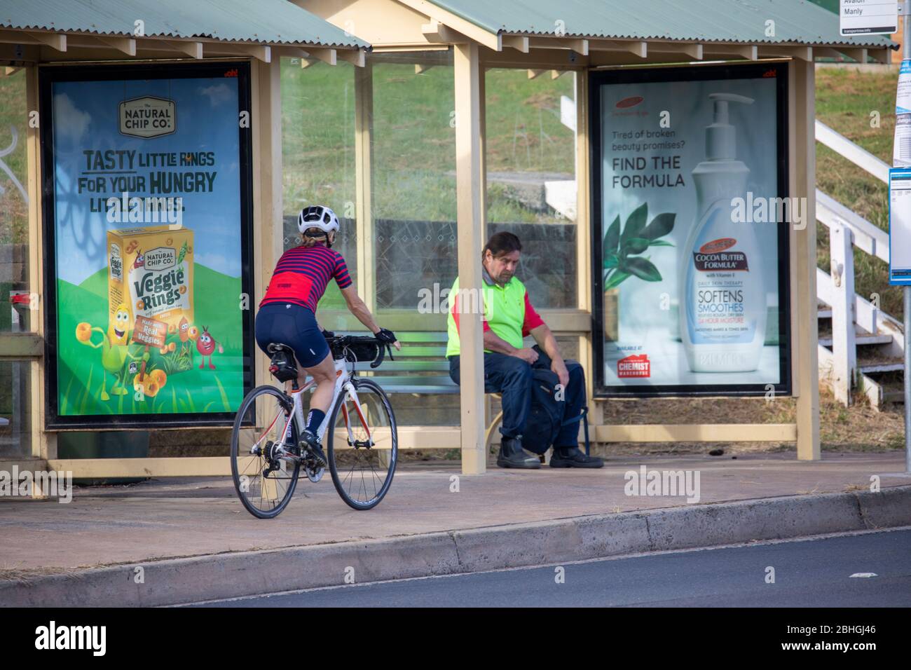 COVID 19 lock down in Sydney, woman cyclist out on her bike for