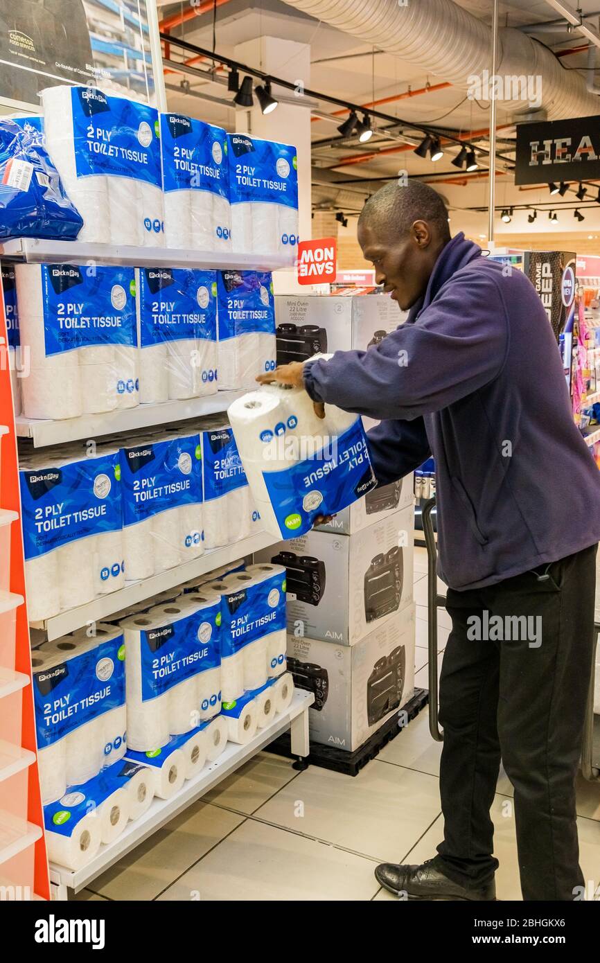 Stacking shelves supermarket hires stock photography and images Alamy