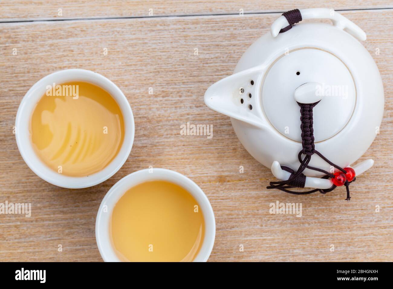 Man hand pouring Tea on Chinese tea cup. Chinese Traditional culture of Traditional Tea Ceremony