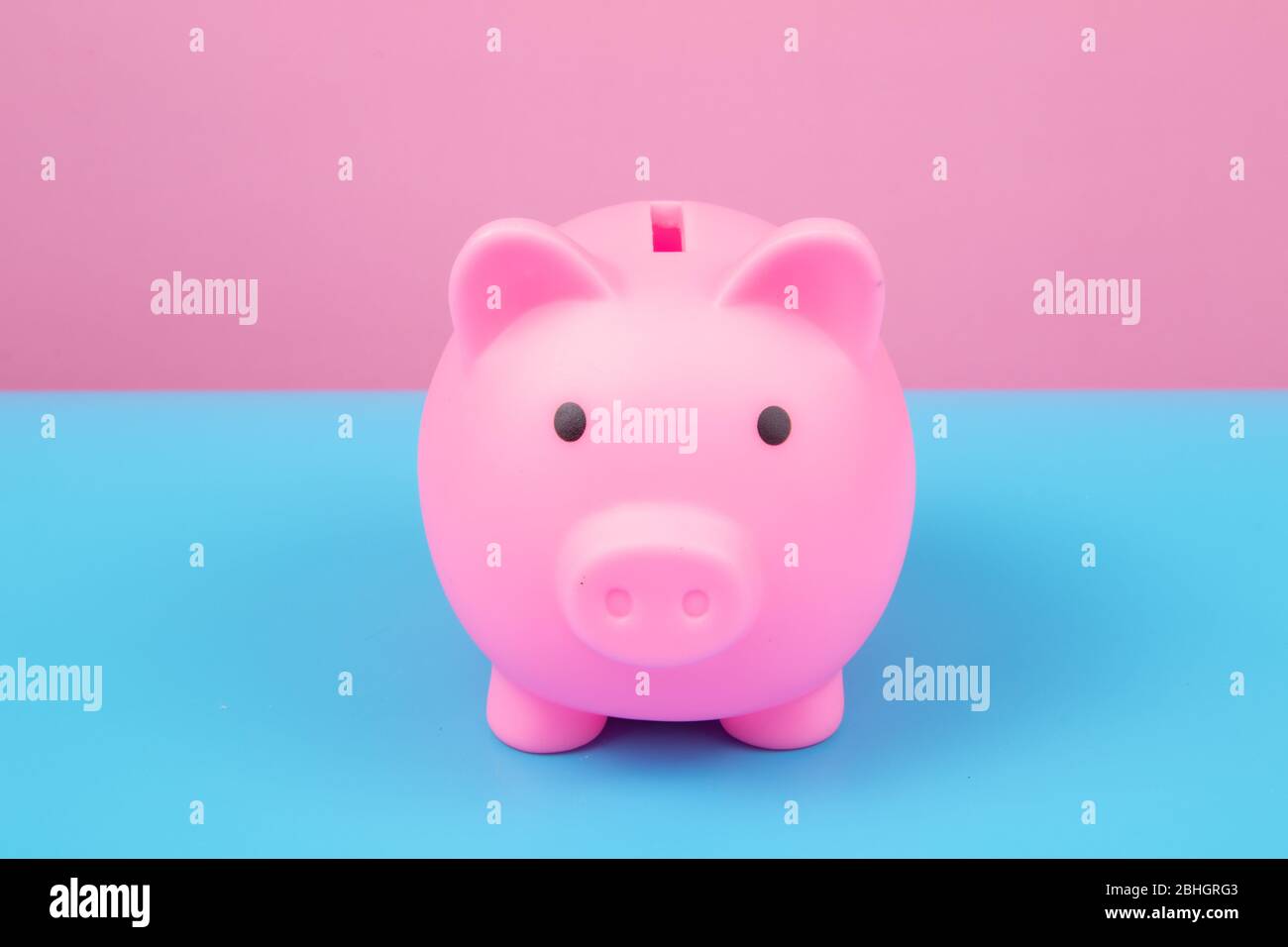 Pink Piggy bank on harmony background. Stock Photo