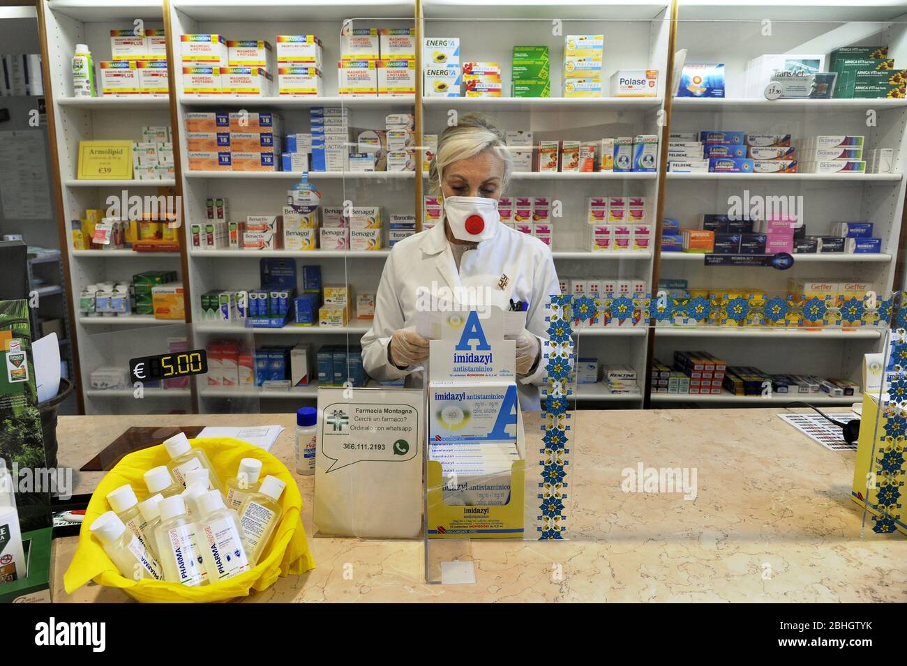 Coronavirus epidemic, live with the mask, the pharmacy, Milan, April 2020 Stock Photo