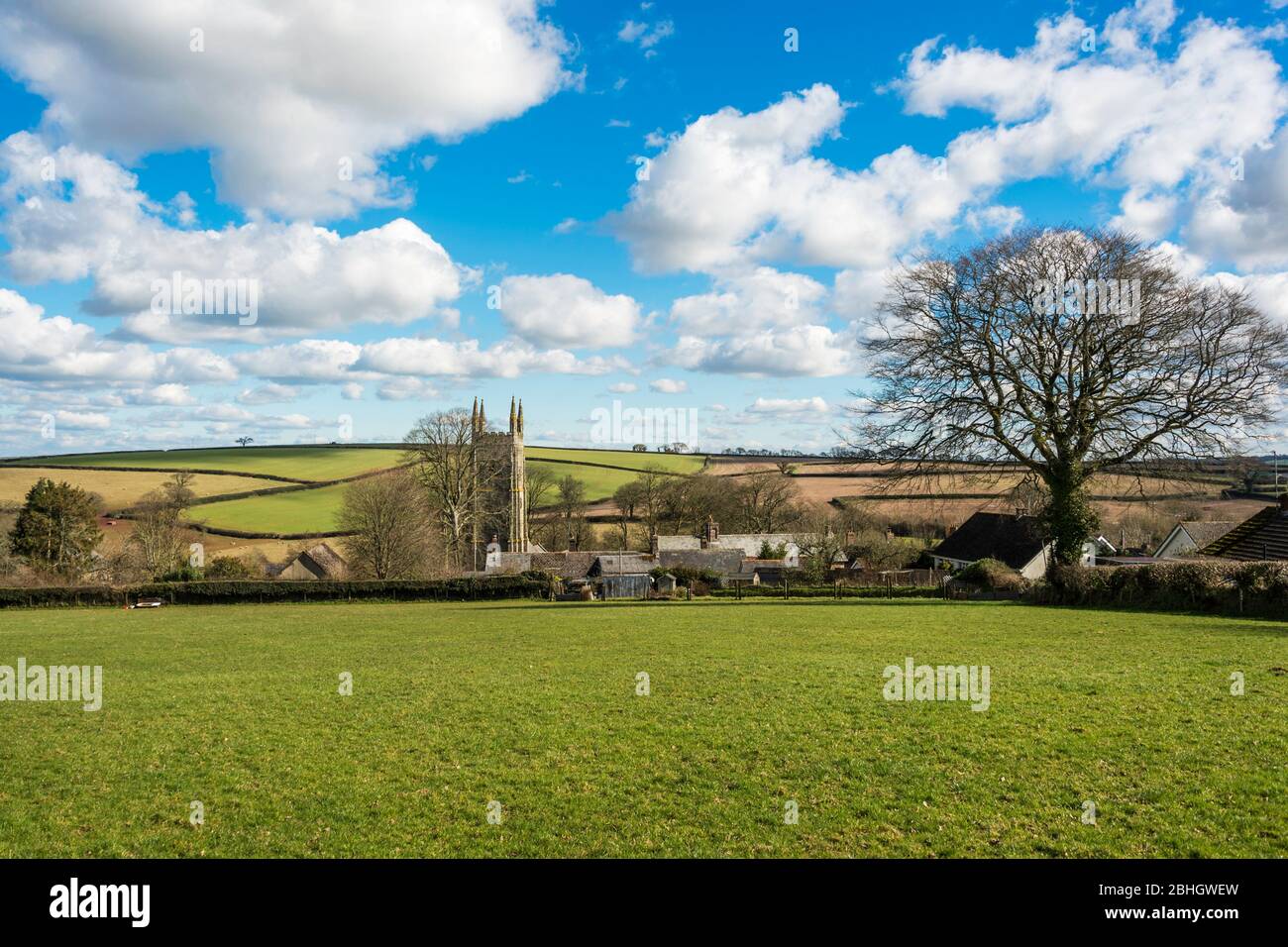 The imposing west tower of St Andrew's Church dominates the village of