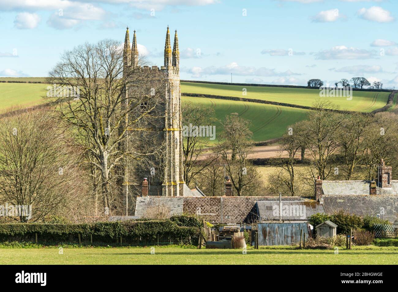 The imposing west tower of St Andrew's Church dominates the village of