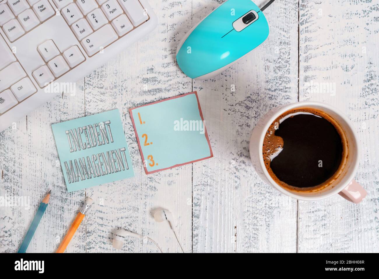 Conceptual hand writing showing Incident Management. Concept meaning Process to return Service to Normal Correct Hazards Technological devices colored Stock Photo