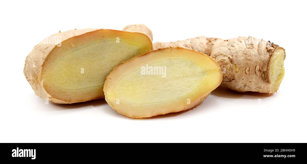 Close-up Of Ginger Over White Background Stock Photo
