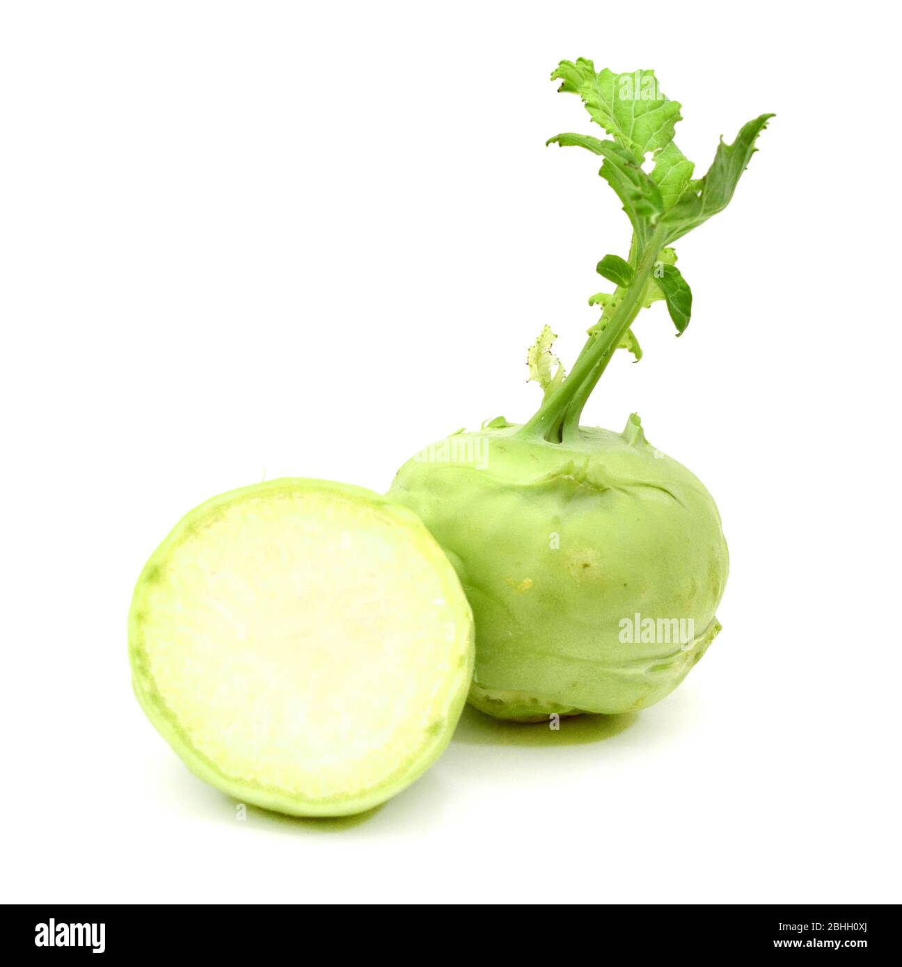 Brussels sprouts and half isolated on white background with clipping path and full depth of field. Stock Photo