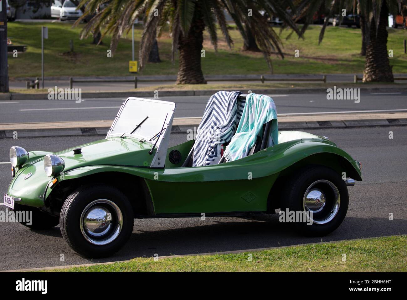 Green beach buggy style heritage car convertible parked in Sydney, Australia Stock Photo