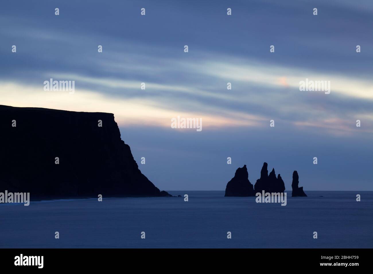 Coastal sea stacks at Reynisdrangar on the Vik coast in South Iceland ...