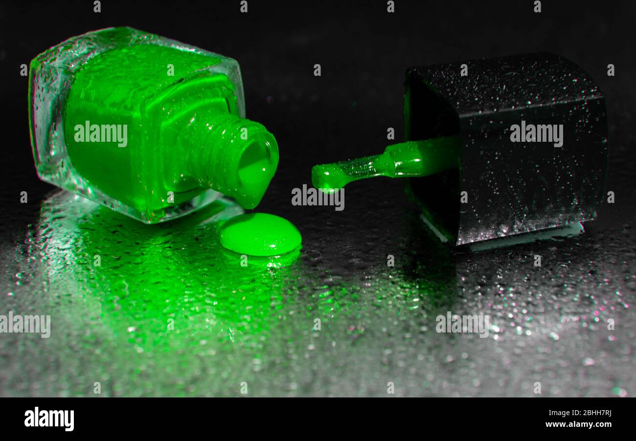 close up of green nail polish on black background Stock Photo