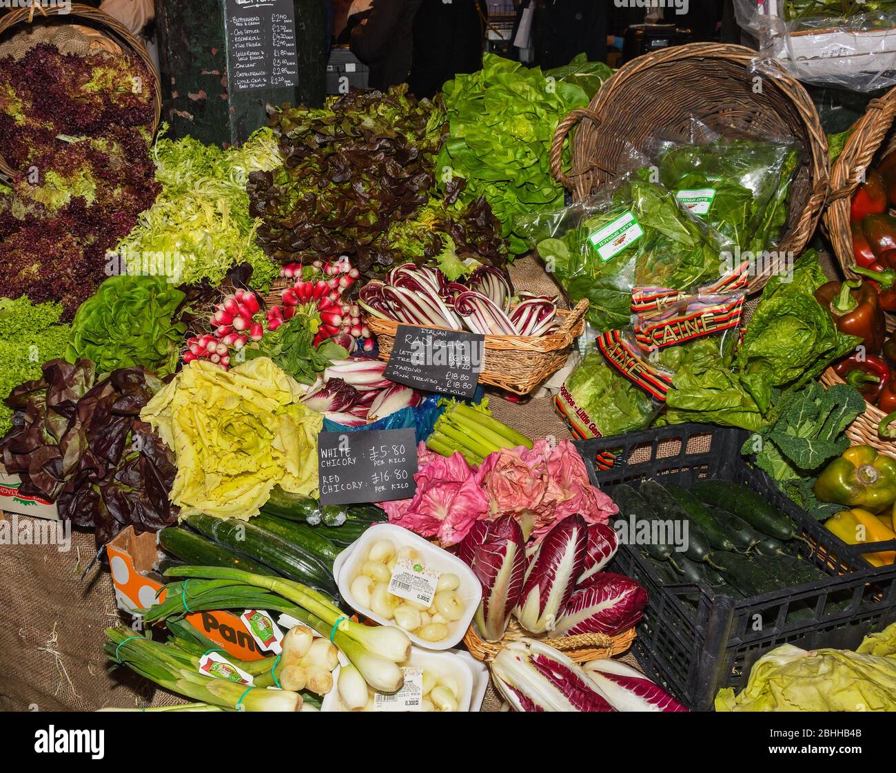 Assortment of fresh salads and vegetables at the market Stock Photo - Alamy