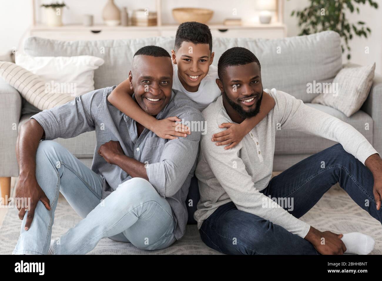 Portrait of happy black multi generation family at home Stock Photo