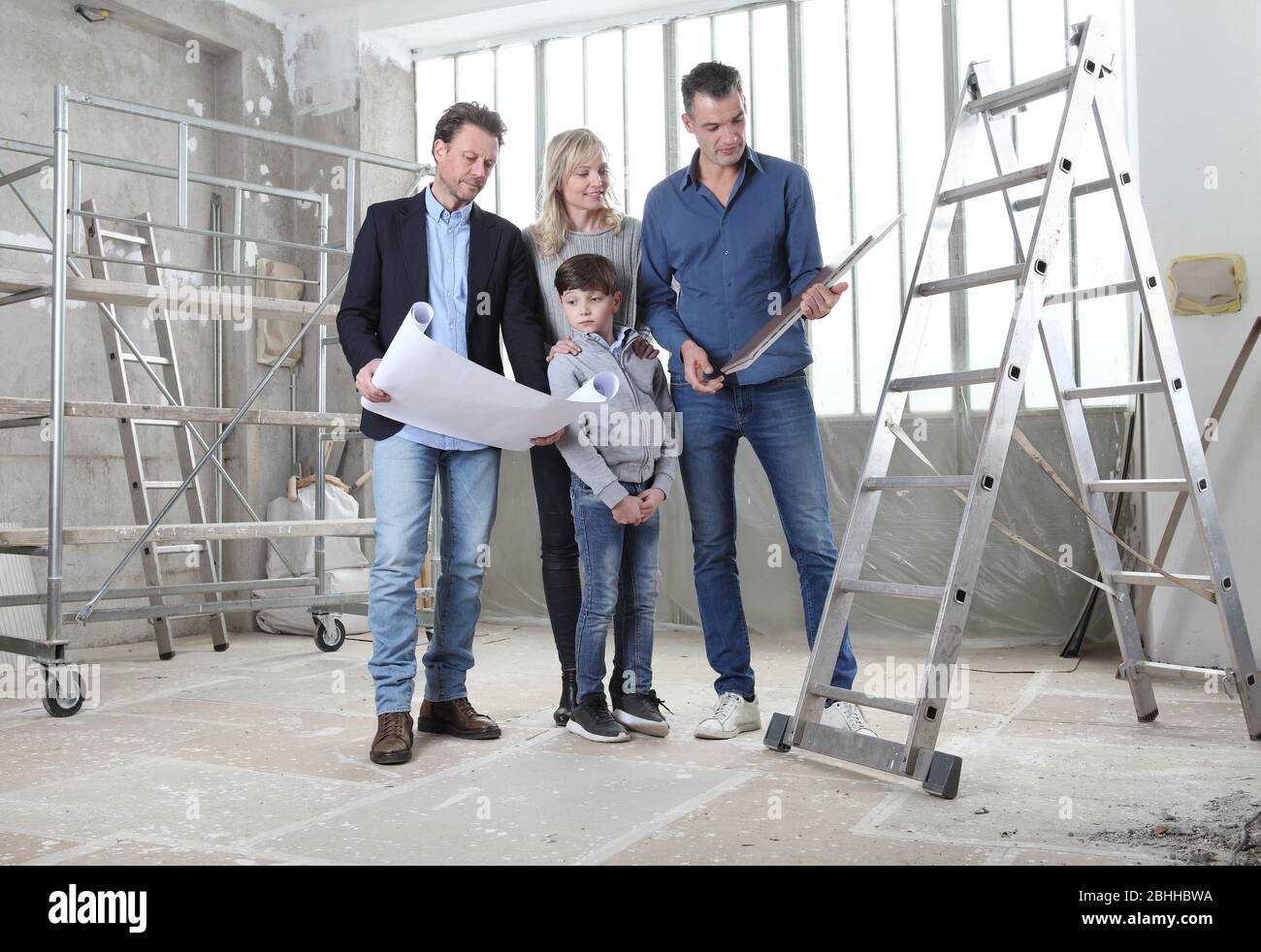 Contruction Project Parents Architect showing house design plans to a family with child. Meeting at ...