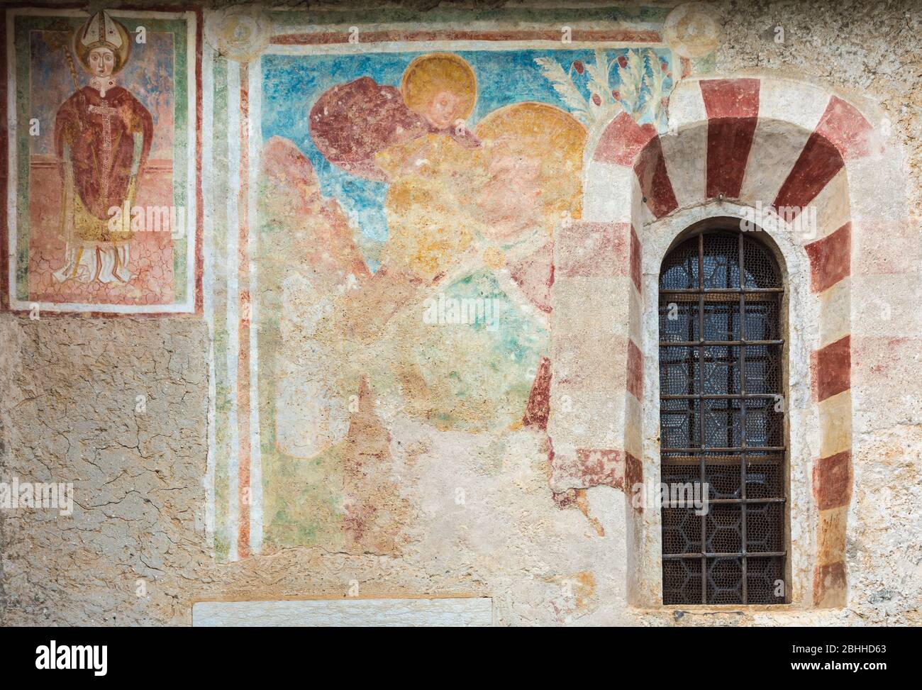 Valuable medieval frescoes in the Church of San Marcello in Dardine, Province of Trento, Trentino Alto Adige, Italy - january 29, 2019 Stock Photo