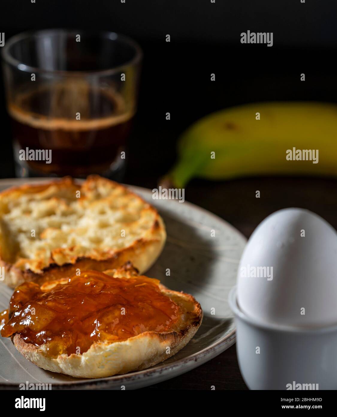 Orange marmalade on toasted English muffin Stock Photo Alamy