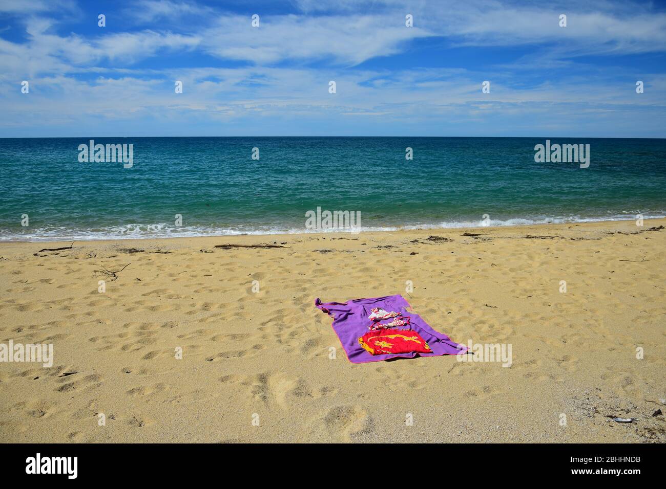 A wonderful place to rest on the beach of Anapai Bay with a towel and a bikini. New Zealand, South Island, Abel Tasman National Park. Stock Photo