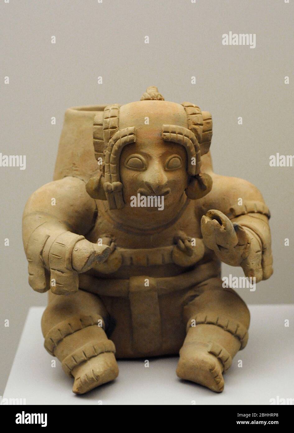 Vessel in the shape of a sitting human figure. Ceramic. Jama-Coaque culture. Regional Development Period (500 BC-500 AD). Coast of Ecuador, South America. Museum of the Americas, Madrid, Spain. Stock Photo