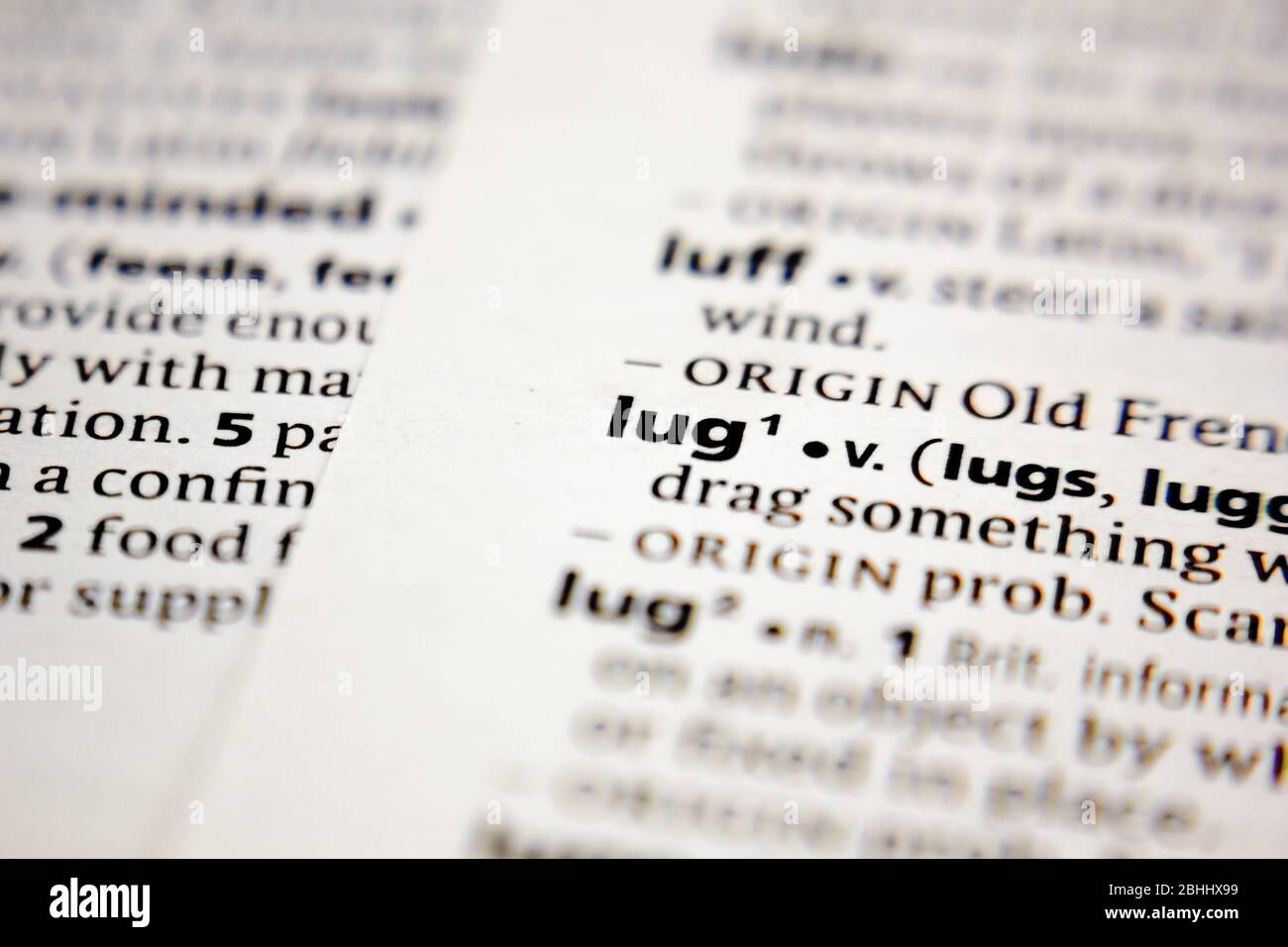 Word or phrase lug in a dictionary Stock Photo Alamy