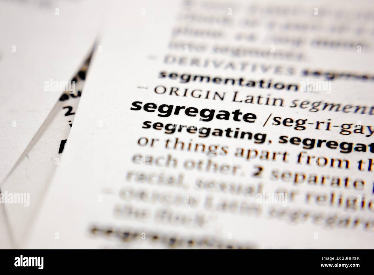 Word or phrase segregate in a dictionary Stock Photo - Alamy